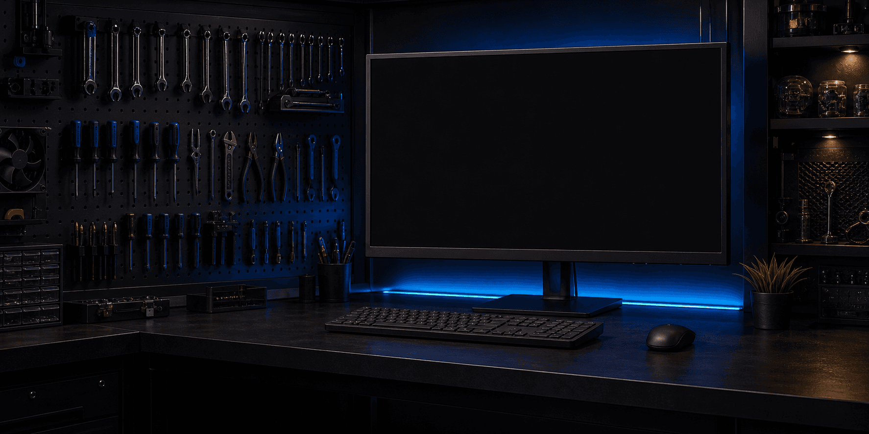 Organised IT project workspace with a monitor and technician tools